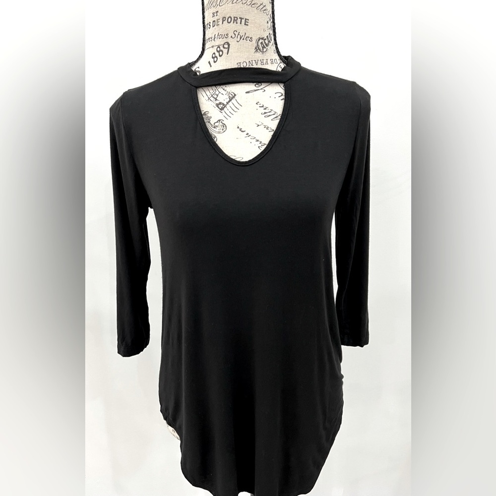 Black blouse , 3 quarter sleeve , long in the back, key hole in front